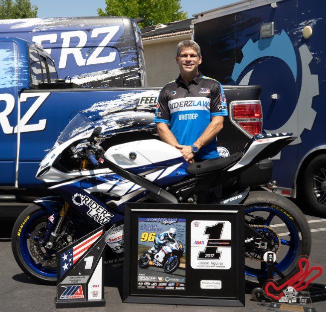 Sy Nazif, RiderzLaw team owner and WERA expert racer, with 2017 MotoAmerica championship Yamaha R6 motorcycle and trophies – Pittsburgh motorcycle accident attorneys serving PA, IL, MO, NV, CA